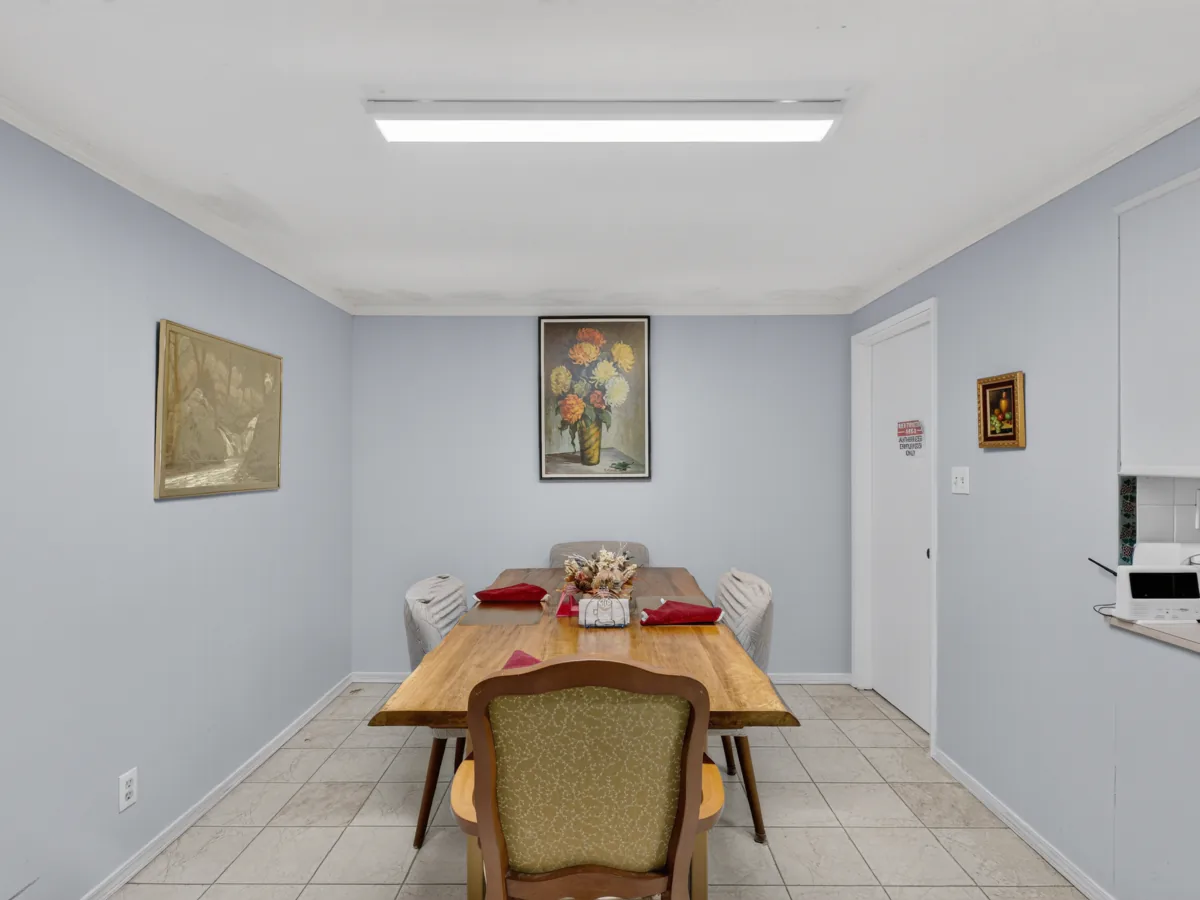 Family-style dining table at A Care Of Joy